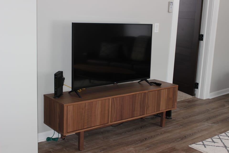 Big-screen smart TV. Streaming apps available.