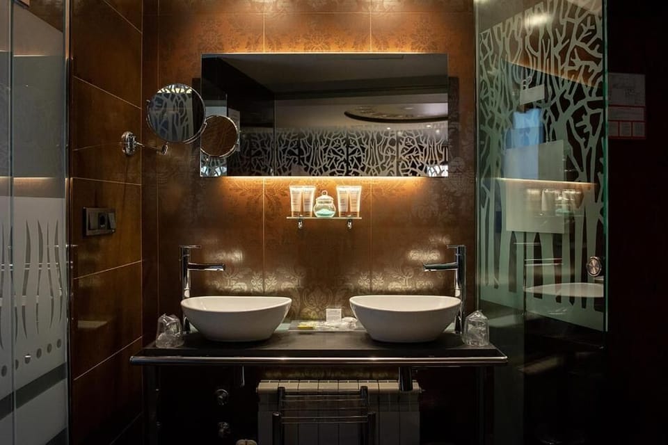 Eco-friendly toiletries, hair dryer, bidet, towels