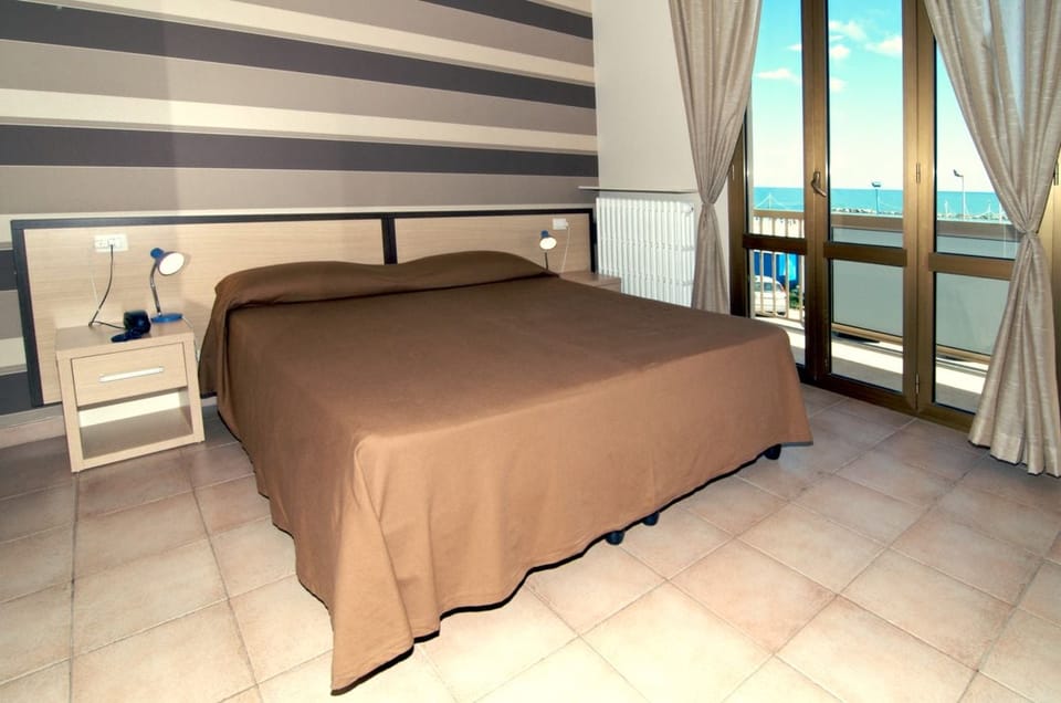 Frette Italian sheets, premium bedding, down comforters