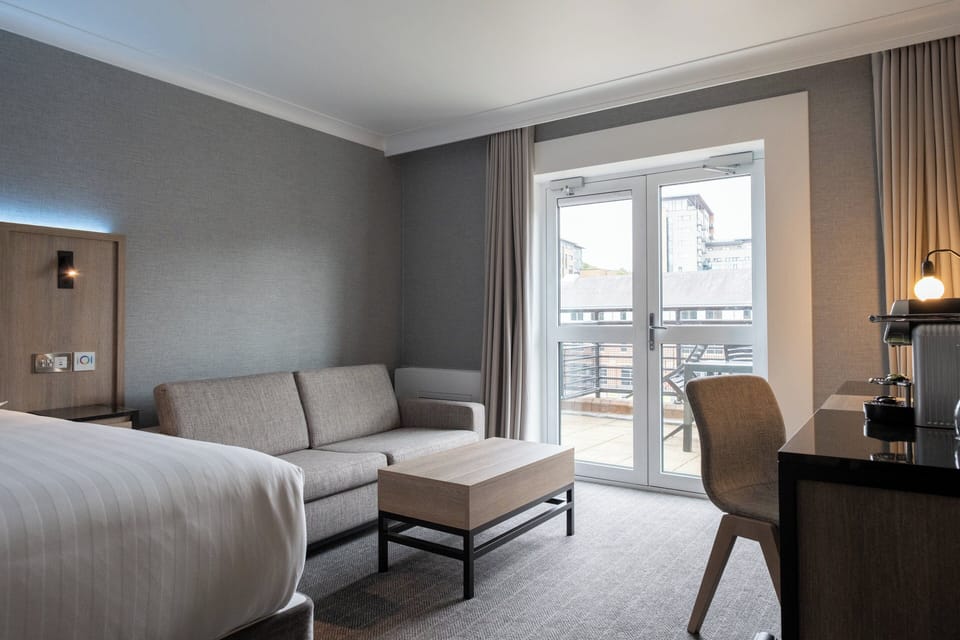 Deluxe Suite, 1 King Bed, Balcony (Super King, Quay View) | In-room safe, desk, laptop workspace, soundproofing
