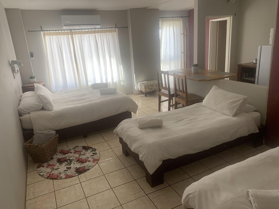Family Room (Grey) | Desk, iron/ironing board (on request), WiFi (free), bed sheets