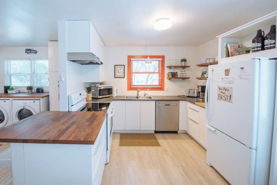 The kitchen is outfitted with everything you'll need to prepare a meal for your entire group.  All plates, bowls, silverware, cookware and basic kitchen essentials are included!