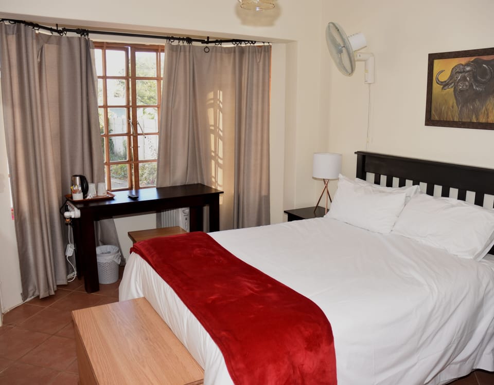 Comfort Room (1) | Individually decorated, desk, laptop workspace, iron/ironing board