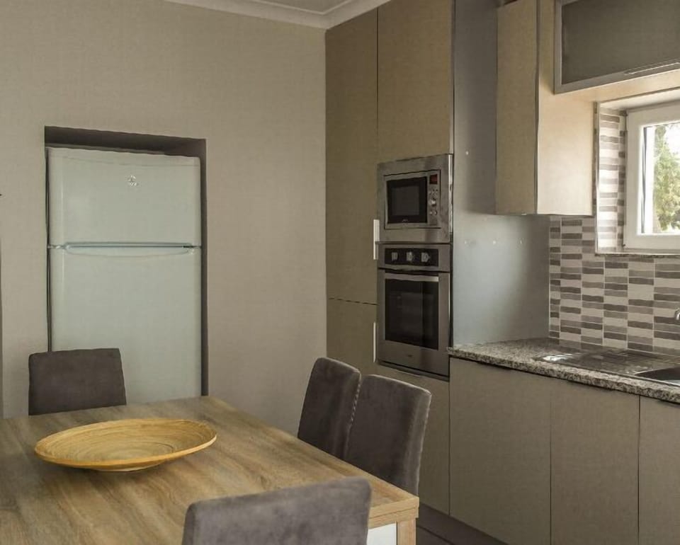Classic Apartment, 1 Bedroom | Private kitchen | Coffee/tea maker, full-size fridge, microwave, oven