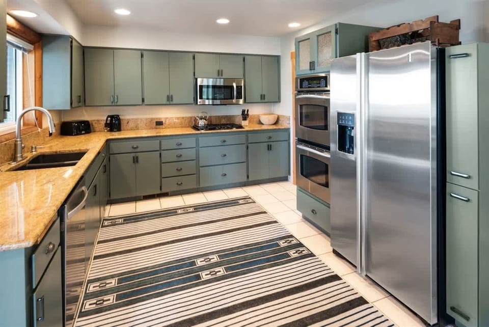 Large fully appointed kitchen with great appliances and gas range.