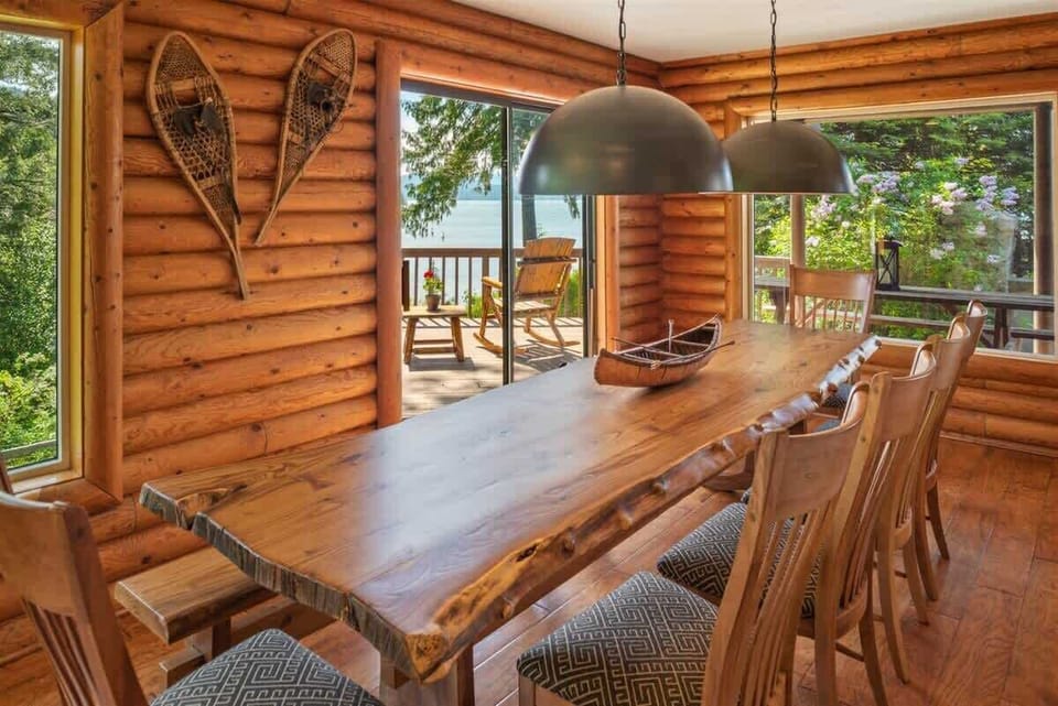 Gorgeous custom dining table with lake views.