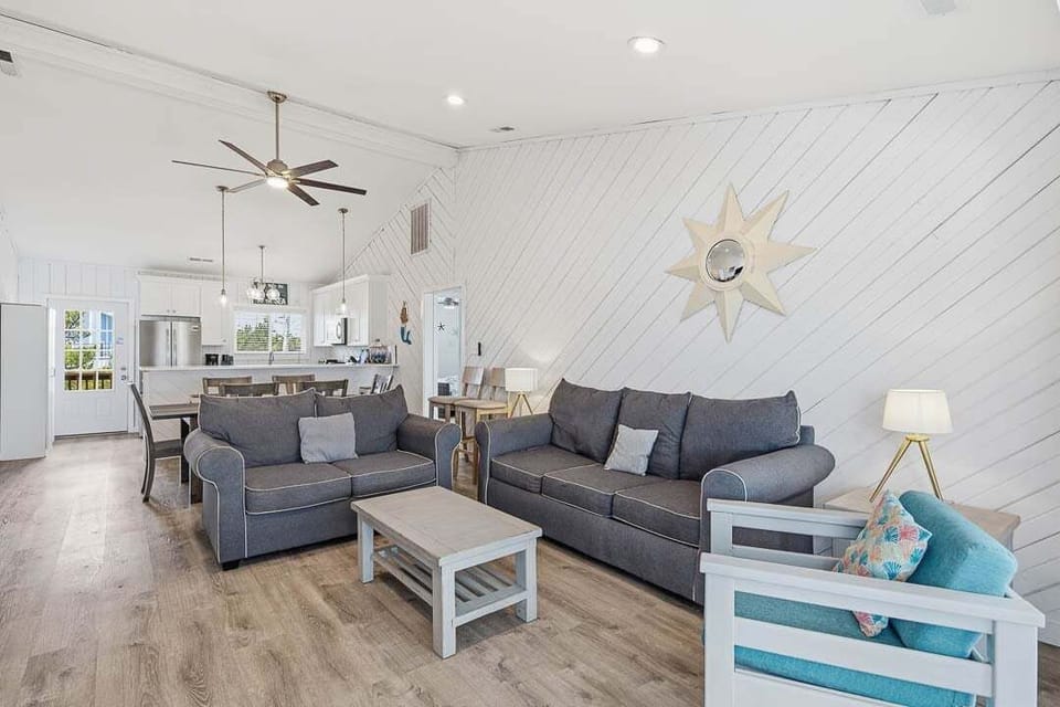 Top-Level Living Room with Access to Sunroom