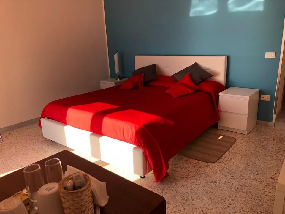 Deluxe Double Room, Non Smoking, Sea View (Azzurra) | Hypo-allergenic bedding, down comforters, memory foam beds, desk