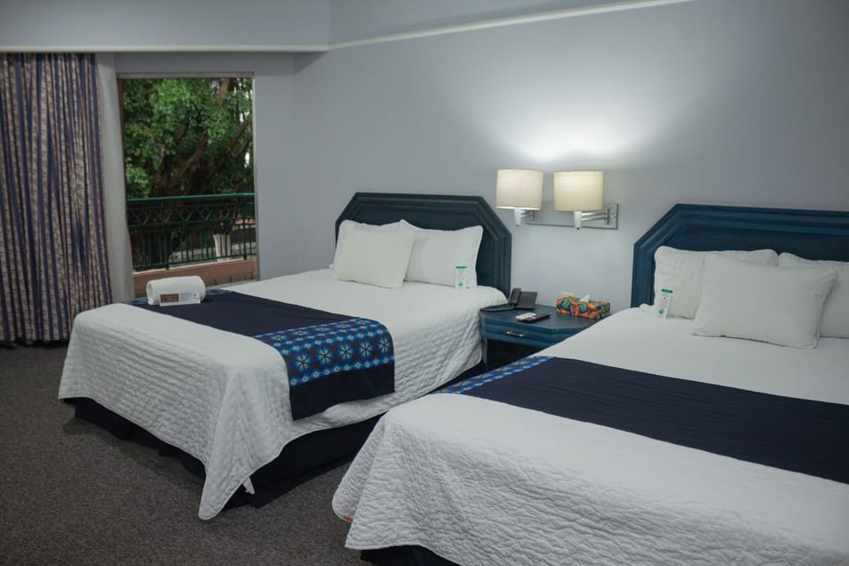 Standard Room, 2 Queen Beds | Premium bedding, iron/ironing board, free WiFi, bed sheets