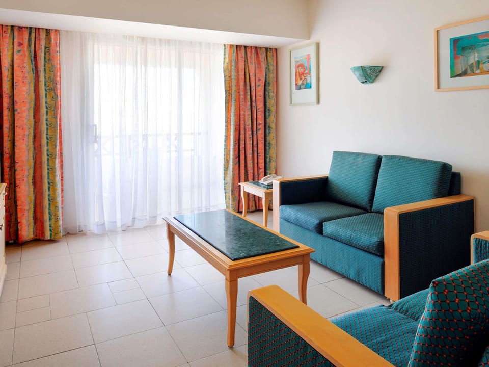 Superior Suite, 1 King Bed, Sea View | Minibar, in-room safe, iron/ironing board, free WiFi