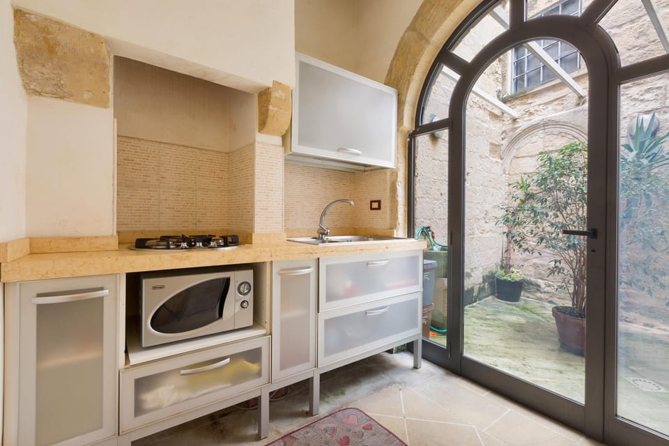 Standard House, 1 Bedroom | Private kitchen | Full-size fridge, microwave, stovetop, cookware/dishes/utensils