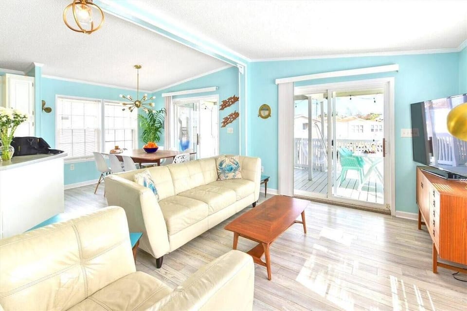 Come relax in our bright, modern, beachy great room where everyone can gather together in this open floor plan and enjoy great views of the bay together! Newly renovated! Also, enjoy our 60inch HD, DVR, Smart TV with ESPN!