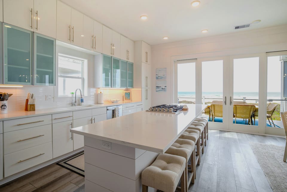 A large kitchen island with full ocean views from wherever you stand