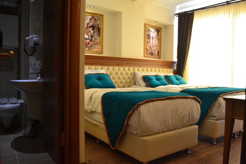 Triple Room | Frette Italian sheets, premium bedding, down comforters