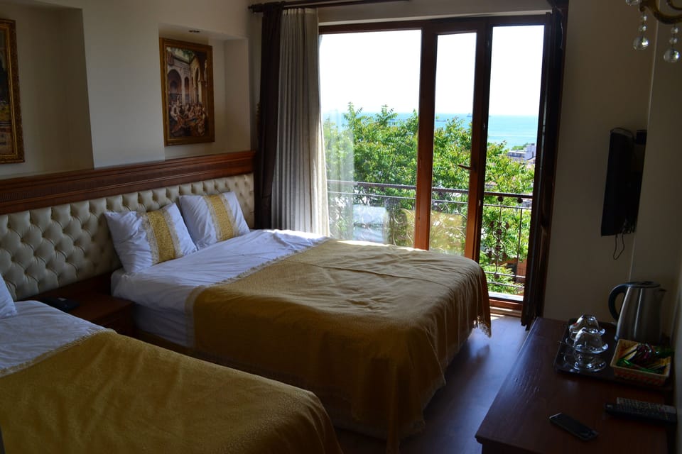 Triple Room, Sea View | Frette Italian sheets, premium bedding, down comforters