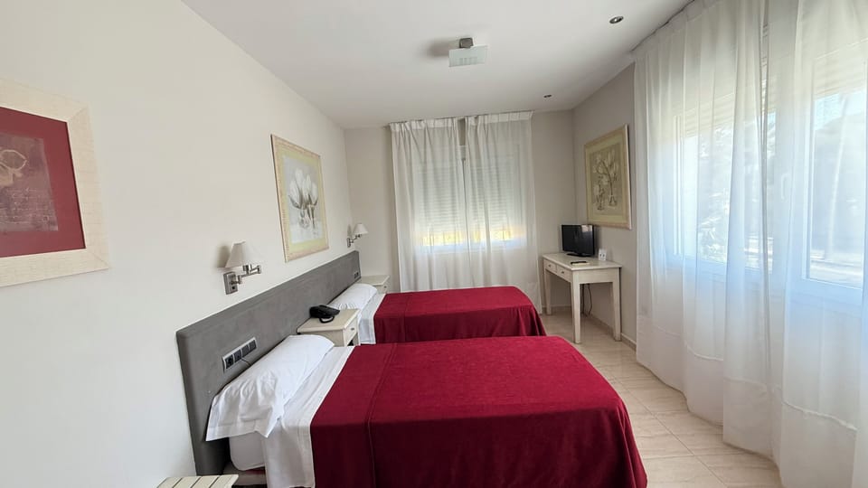 Desk, free WiFi, bed sheets