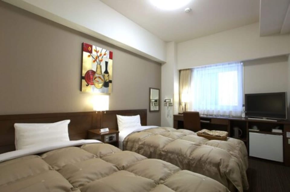 Desk, iron/ironing board (on request), WiFi (free), bed sheets
