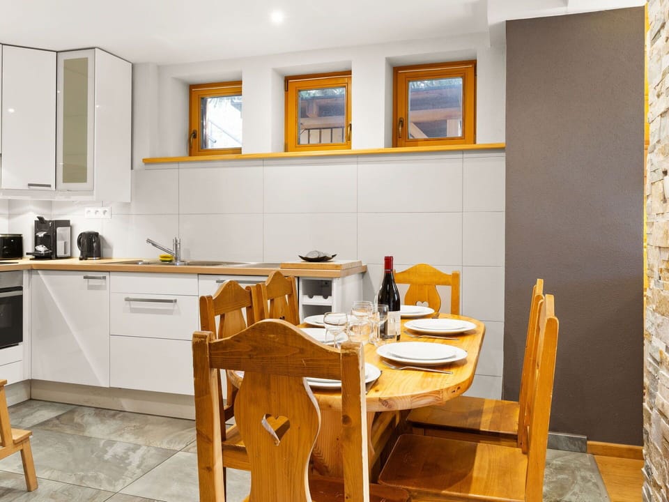 Furniture, Property, Picture Frame, Cabinetry, Wood, Table, Countertop, Interior Design, Chair, Kitchen Stove