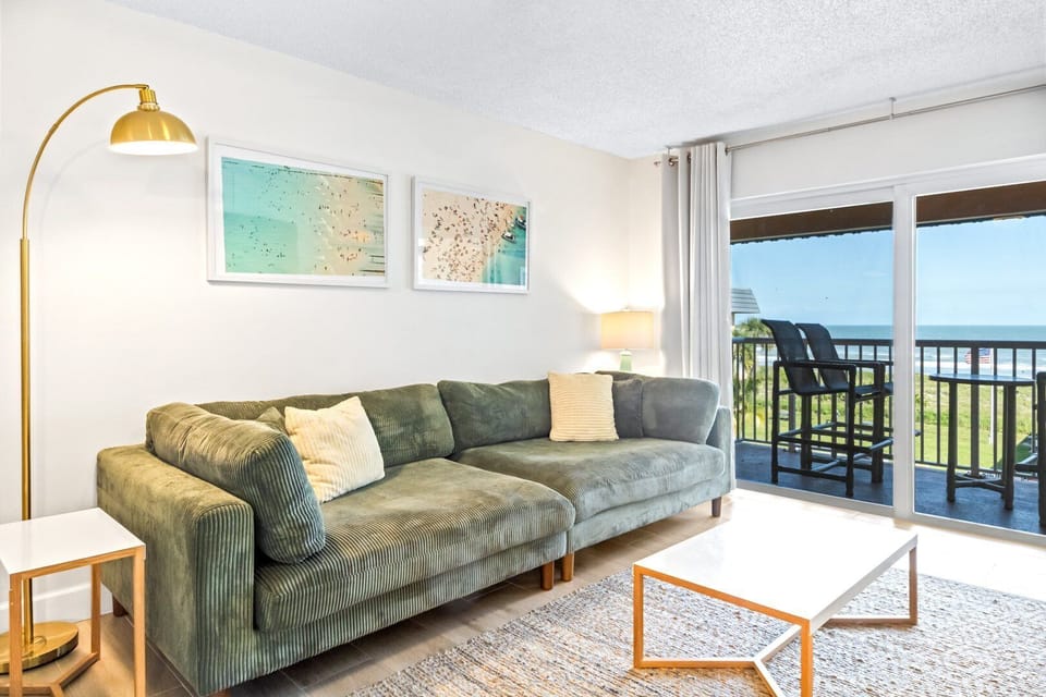 Bright and beachy living room with a view!