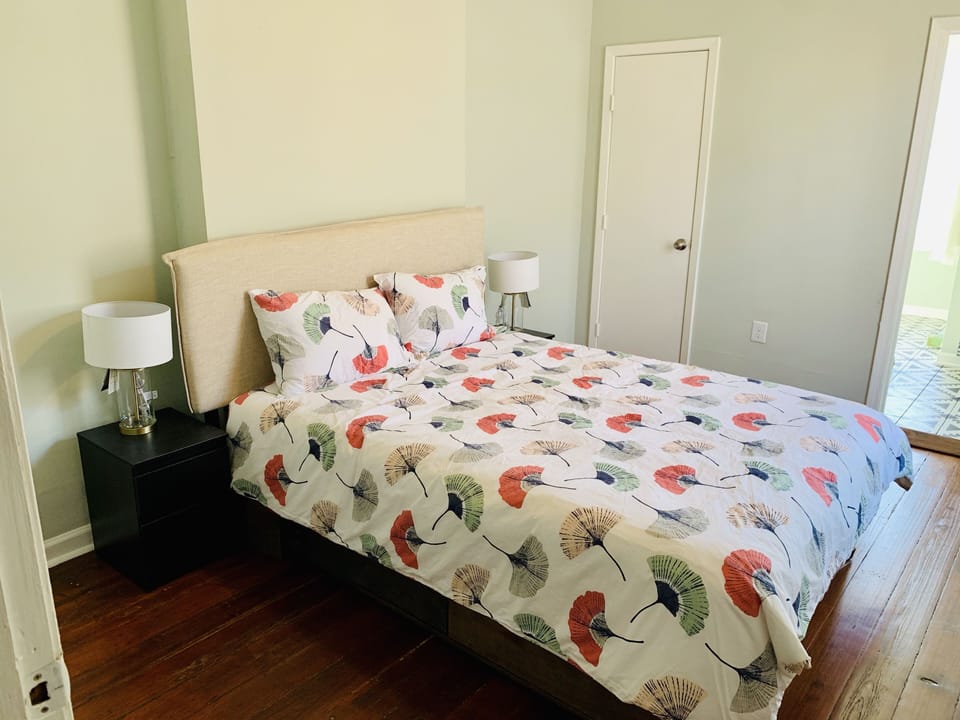 Upstairs bedroom- Brand new queen bed, mattress and linens!  Private bath.