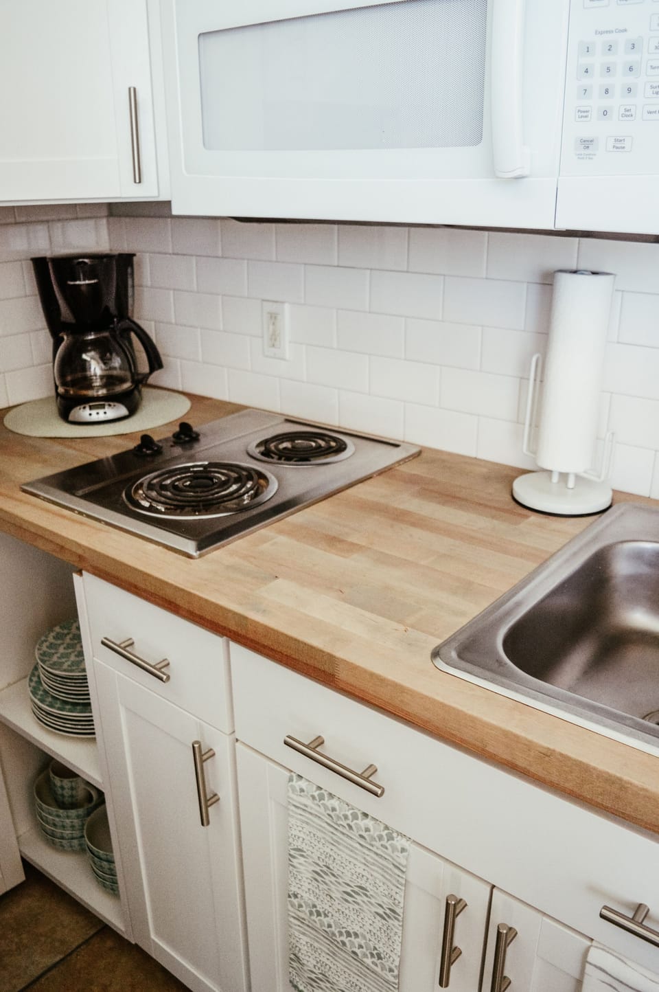 Two-eye stove top and microwave