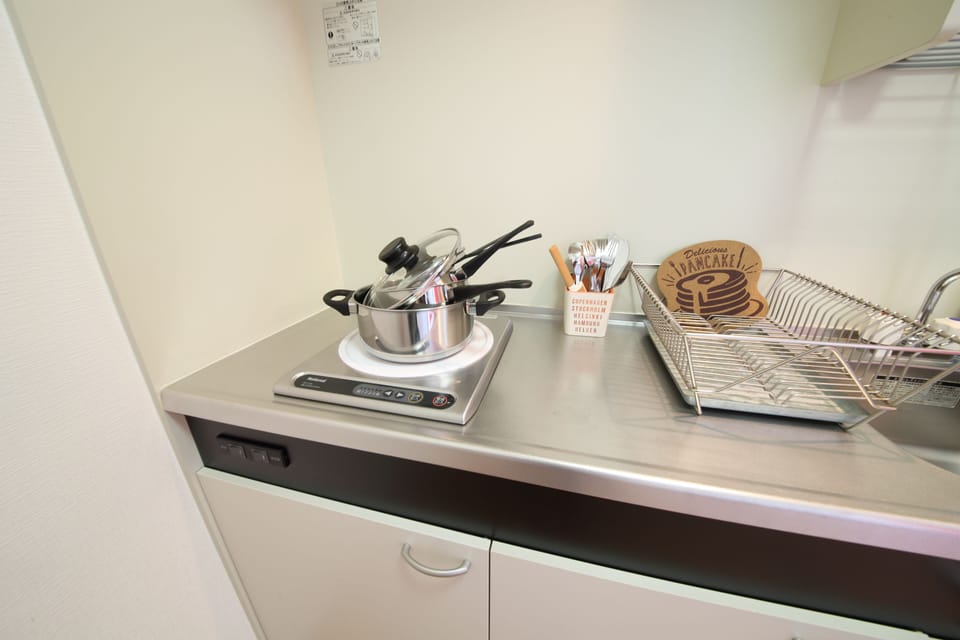 1 Bedroom Apartment | Private kitchenette | Fridge, microwave, stovetop, electric kettle