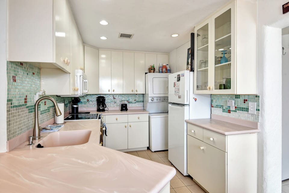 Full Kitchen with Laundry...pots, pans, and utensils ready for you!