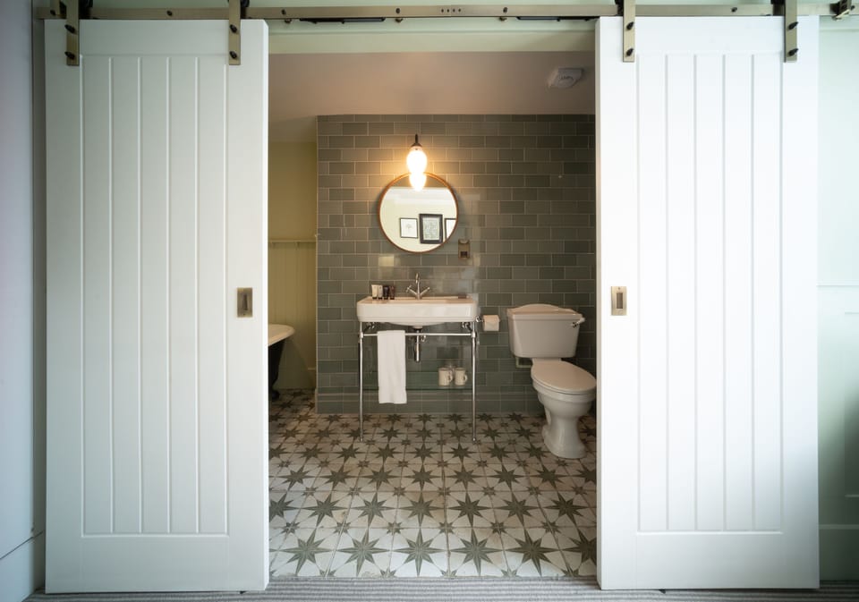 Cosy Room | Bathroom | Designer toiletries, hair dryer, towels