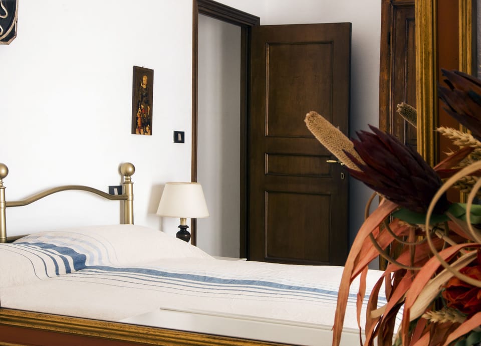 Deluxe Apartment, 2 Bedrooms (Melograno) | 2 bedrooms, down comforters, laptop workspace, blackout drapes