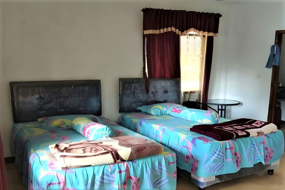 Deluxe Room, Kitchen | Bed sheets