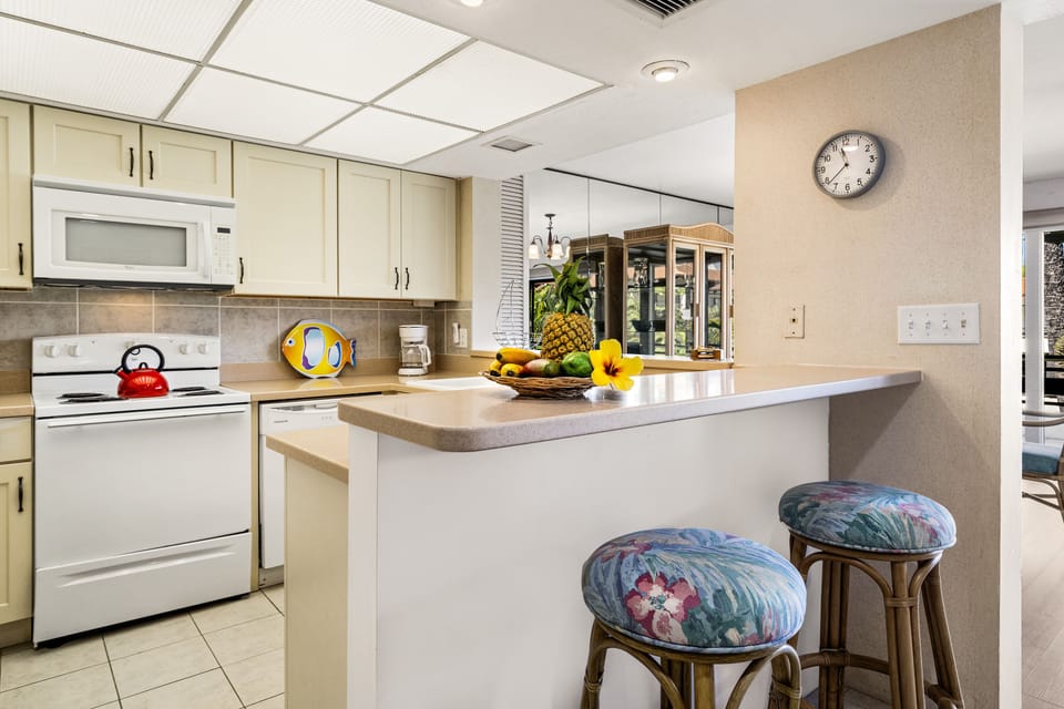 Kitchen with Bar Stools at Casa De Emdeko 311