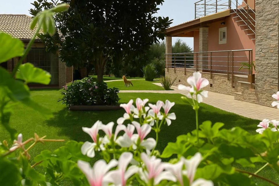 Lush Green Garden with Flowering Plants and Wooden Playhouse