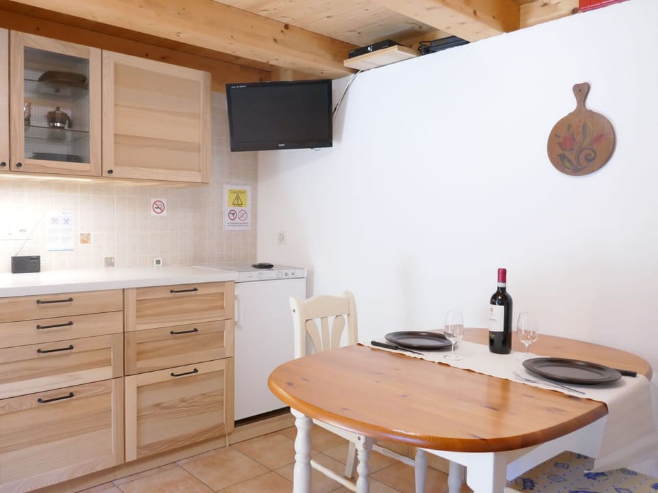 Furniture, Flooring, Interior Design, Wood, Countertop, Floor, Kitchen, Cabinetry, Ceiling, Room