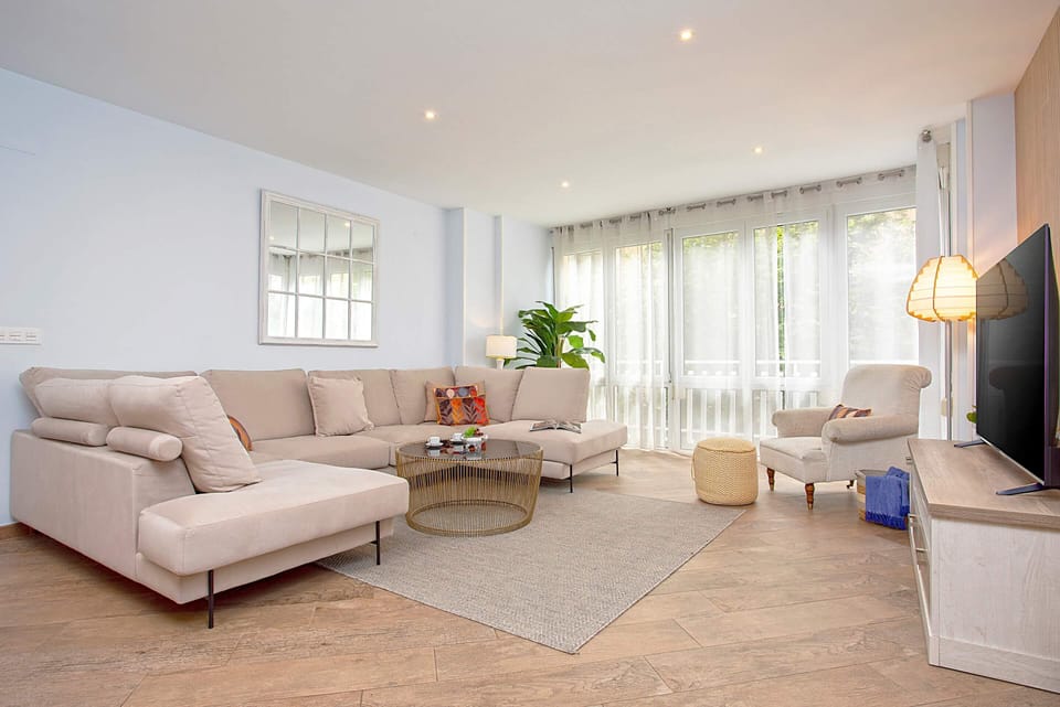Apartment (4 Bedrooms) | Living area | 32-inch flat-screen TV with cable channels, TV