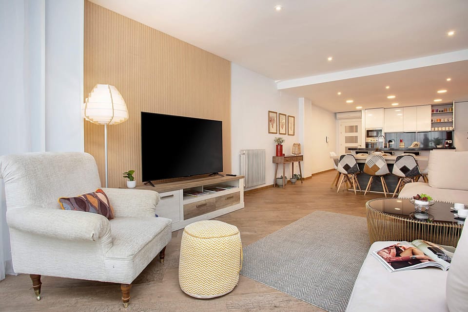 Apartment (4 Bedrooms) | Living area | 32-inch flat-screen TV with cable channels, TV