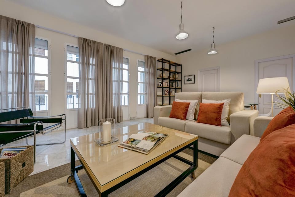 Apartment (1 Bedroom) | Living area | 32-inch TV with cable channels
