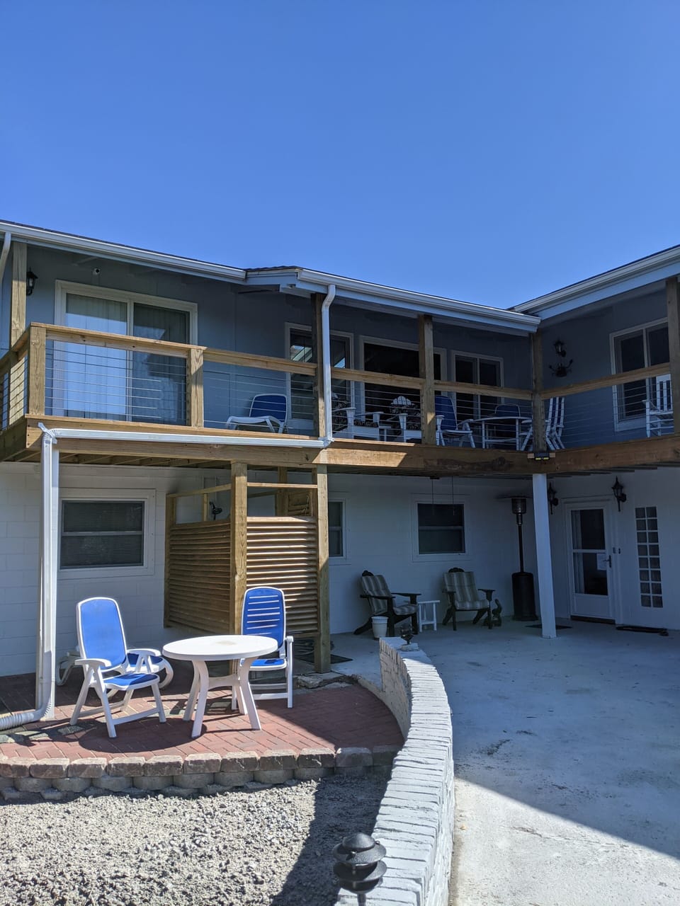Two story home with wrap-around deck 