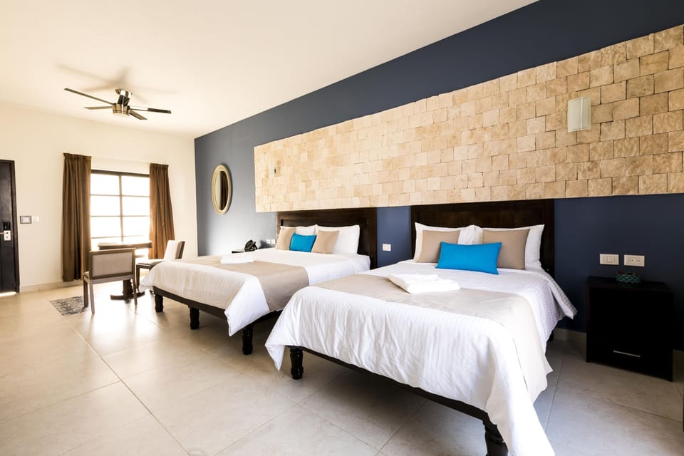Junior Studio Suite, Pool View | Premium bedding, down comforters, in-room safe, individually decorated