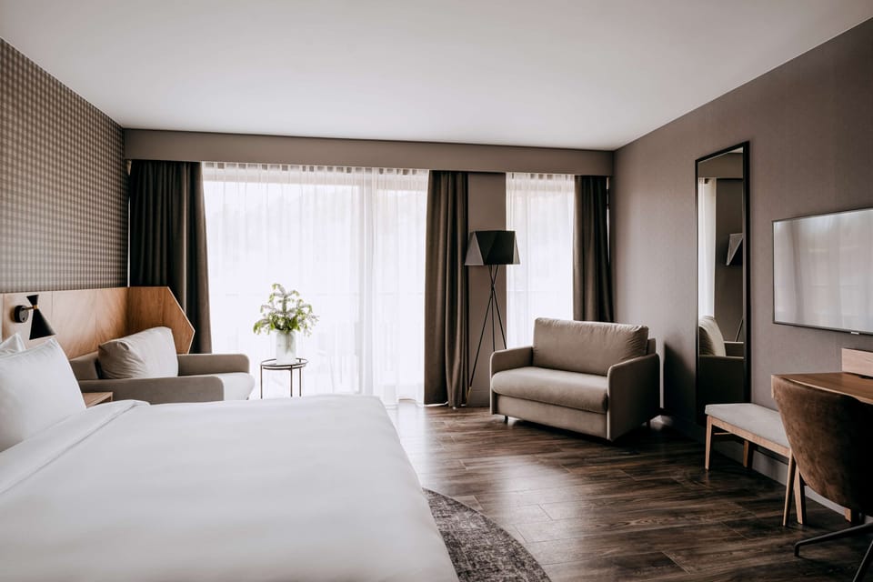 Family Room | Hypo-allergenic bedding, minibar, in-room safe, desk