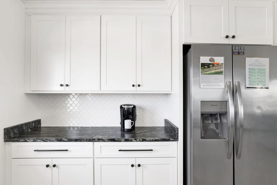 Full size fridge with a coffee bar