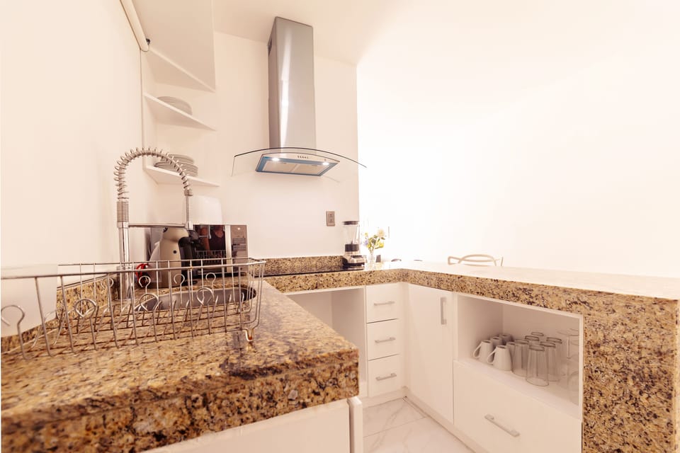 Deluxe Apartment, 2 Bedrooms, Kitchen | Private kitchen | Full-size fridge, microwave, stovetop, coffee/tea maker