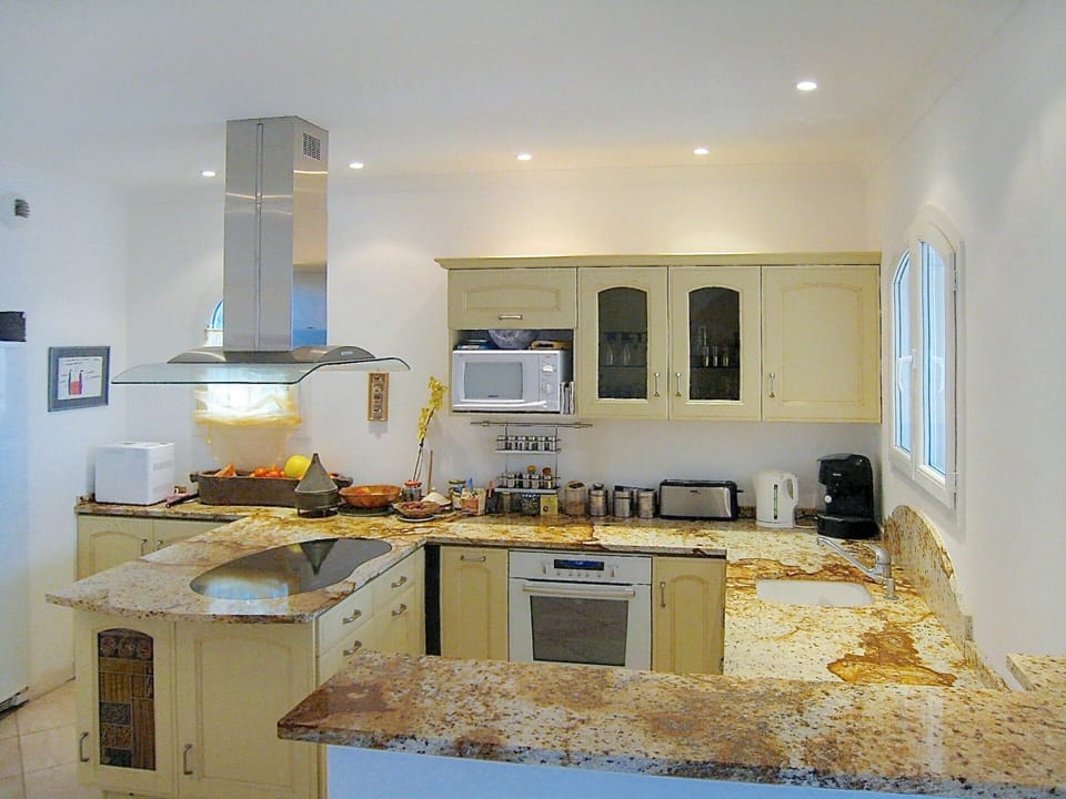 Countertop, Room, Kitchen, Property, Furniture, Cabinetry, Yellow, Interior Design, Building, House