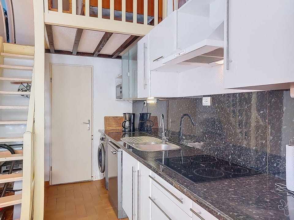 Flooring, Floor, Wood, Interior Design, Room, Major Appliance, Kitchen, Furniture, Countertop, Kitchen Appliance