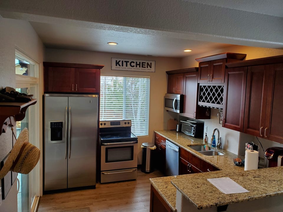 Full Kitchen with Stainless Steel Appliances, Granite Counter Tops, Tall Cabinet