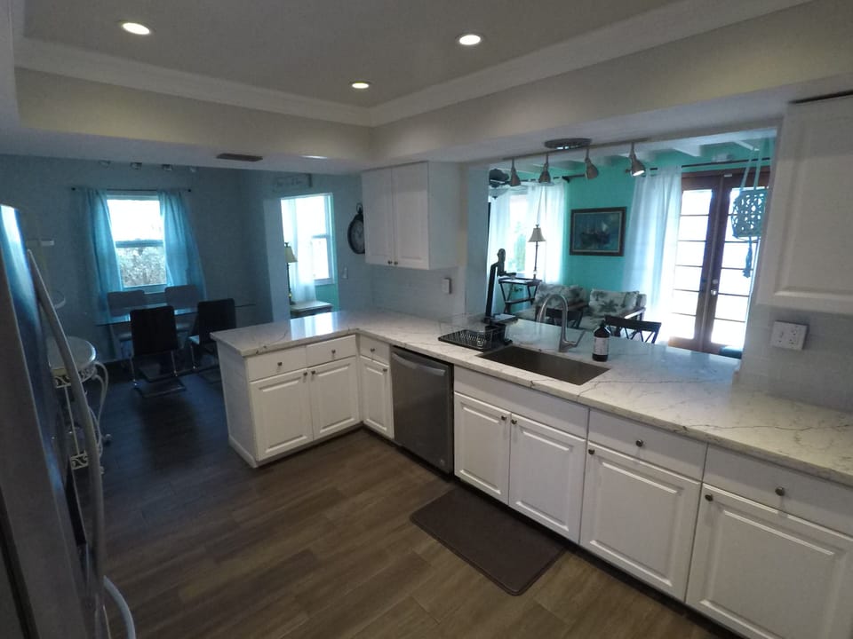 Quartz countertops, brand new appliances, Coffee machine, French Press, Pots.