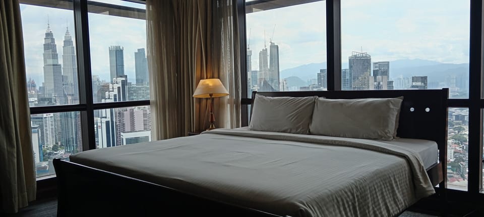 Family Apartment, 2 Bedrooms, City View | Bathroom | Deep soaking tub, free toiletries, hair dryer, slippers