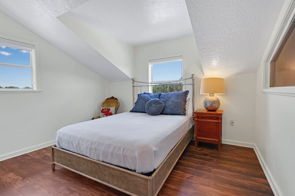 Bedroom 1 is on your right at the top of the stairs.
