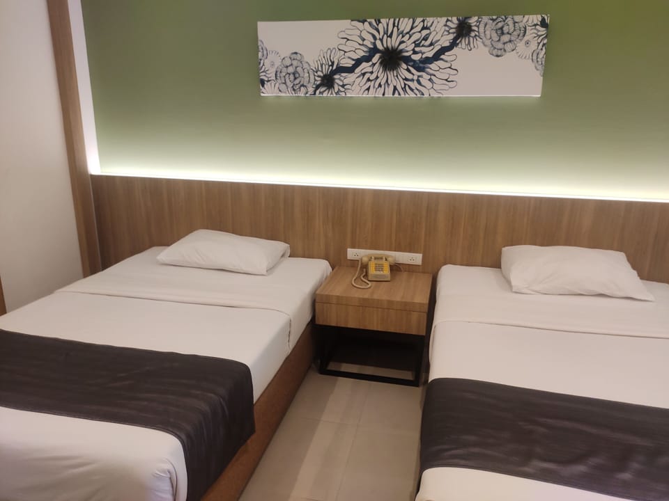 Deluxe Double or Twin Room | In-room safe, desk, laptop workspace, blackout drapes