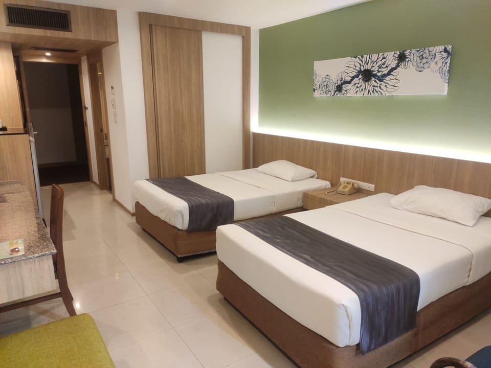 Deluxe Double or Twin Room | In-room safe, desk, laptop workspace, blackout drapes