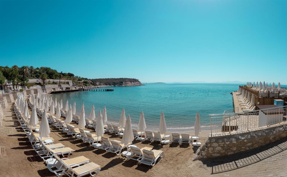 Private beach, sun loungers, beach umbrellas, beach towels